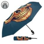 Parapluie Gothique Tête De Mort Rieur: Accessoire Gothique Idéal!